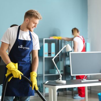 Guy cleaning with logo