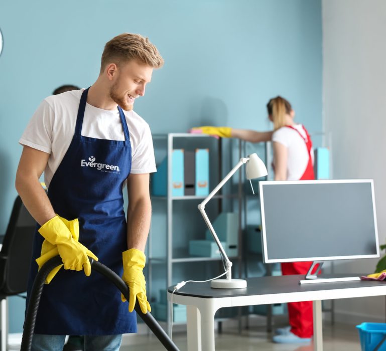 Guy cleaning with logo