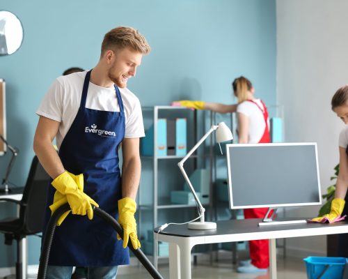 Guy cleaning with logo